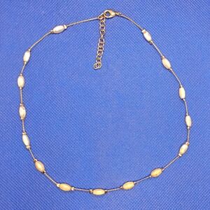 Elegant Gold and Cream Necklace
